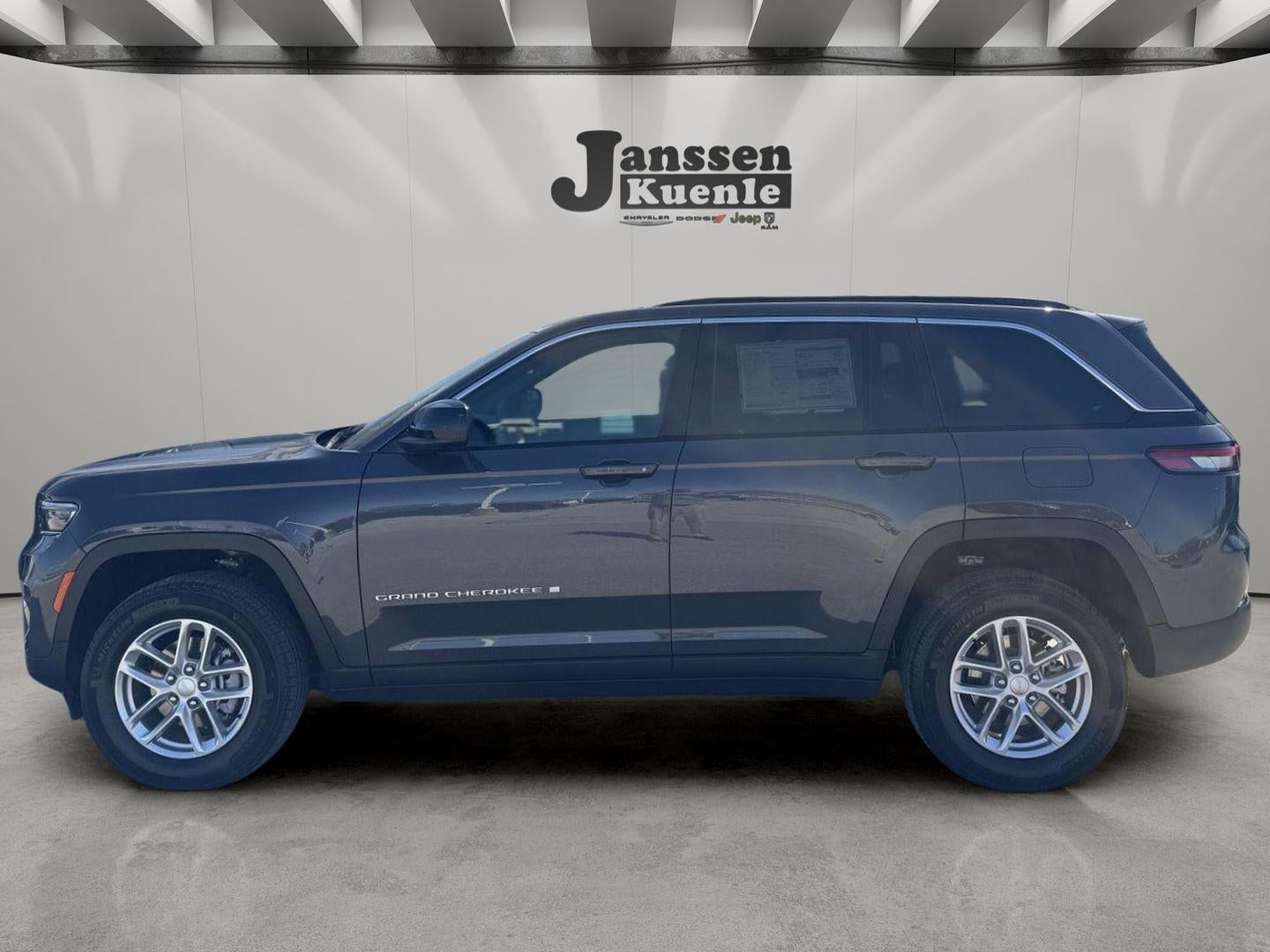 2026 Jeep Grand Cherokee GRAND CHEROKEE LAREDO X 4X4 in Baltic Gray Metallic Clear-Coat Exterior Paint — front three-quarter view