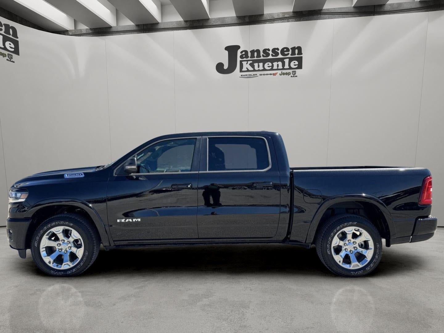 2026 RAM Ram 1500 RAM 1500 BIG HORN CREW CAB 4X4 5'7' BOX in Diamond Black Crystal Pearl-Coat Exterior Paint — front three-quarter view