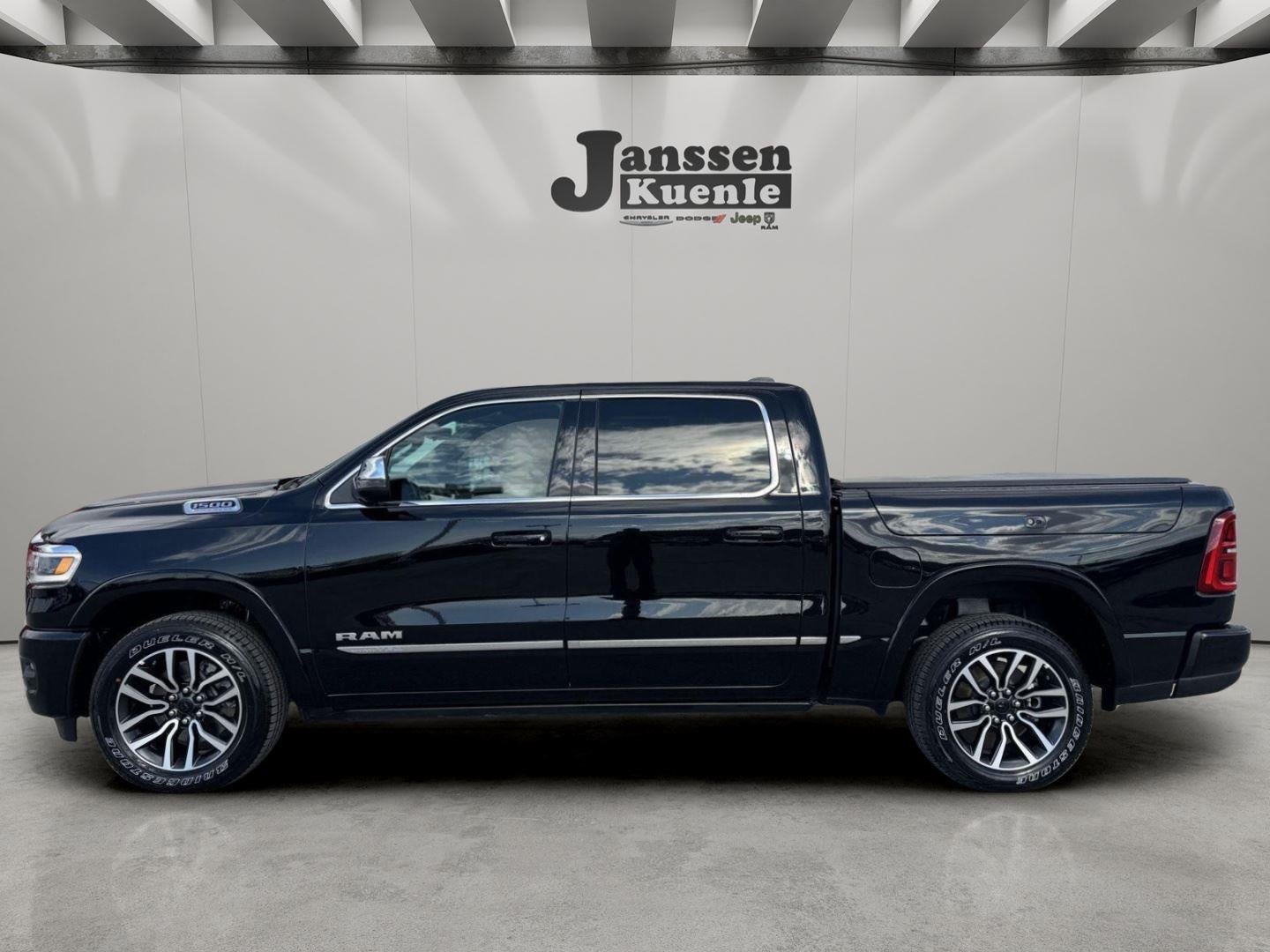 2026 RAM Ram 1500 RAM 1500 LIMITED CREW CAB 4X4 5'7' BOX in Diamond Black Crystal Pearl-Coat Exterior Paint — front three-quarter view
