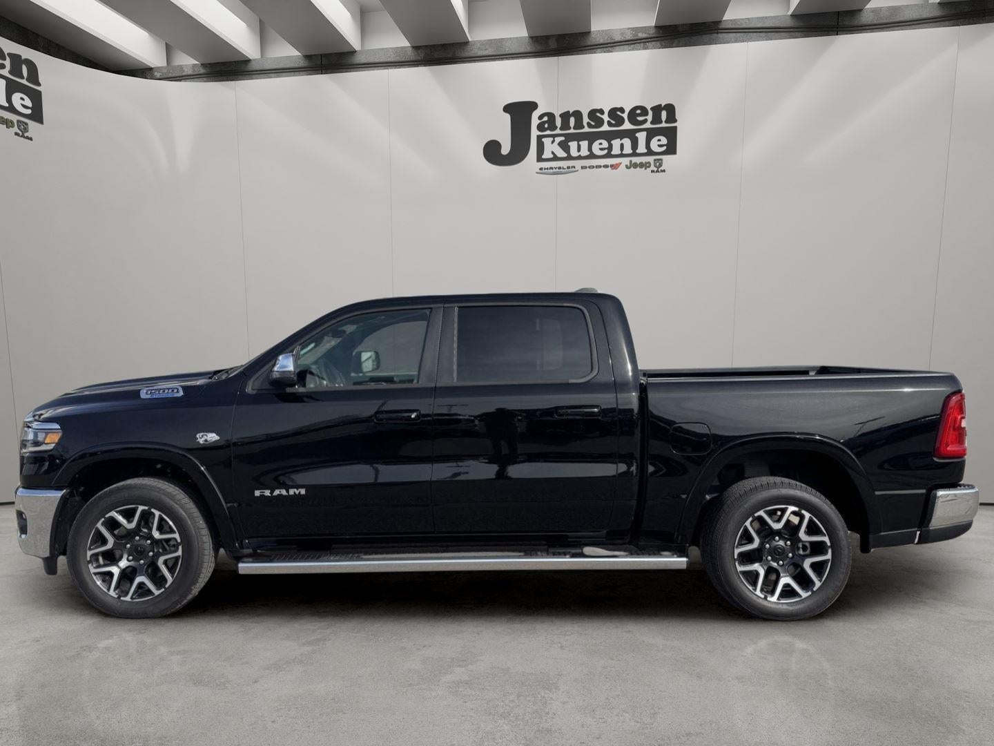 2026 RAM Ram 1500 RAM 1500 LARAMIE CREW CAB 4X4 5'7' BOX in Diamond Black Crystal Pearl-Coat Exterior Paint — front three-quarter view