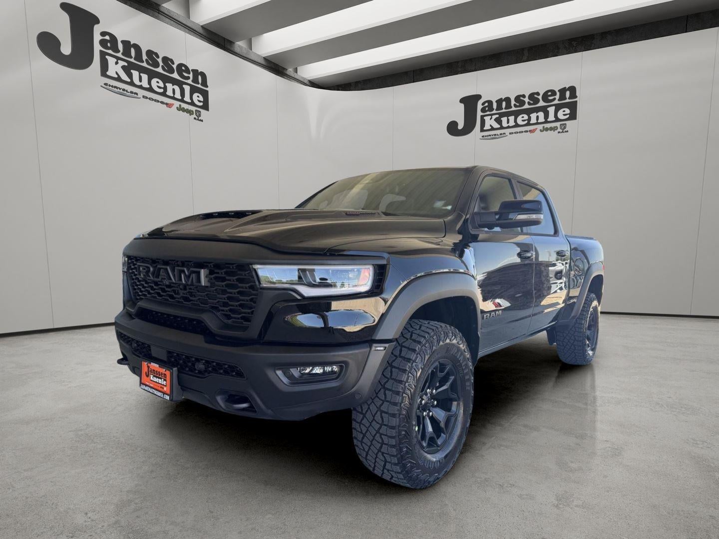 2026 RAM Ram 1500 RAM 1500 RHO CREW CAB 4X4 5'7' BOX in Diamond Black Crystal Pearl-Coat Exterior Paint — front three-quarter view