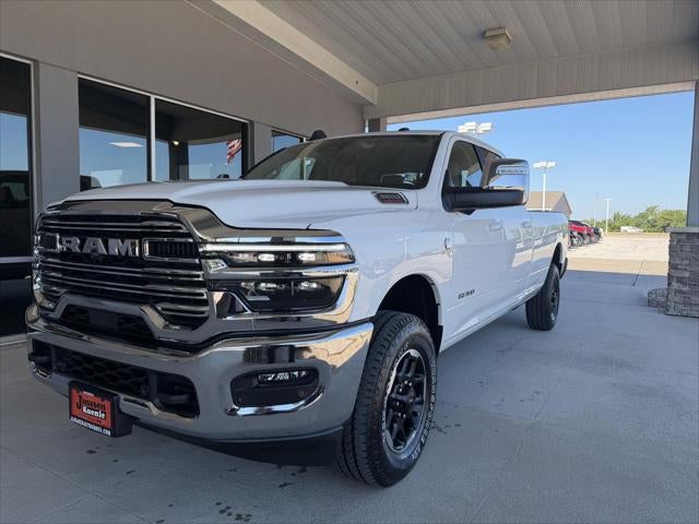 2026 RAM Ram 3500 RAM 3500 LARAMIE CREW CAB 4X4 8' BOX in Bright White Clear-Coat Exterior Paint — front three-quarter view