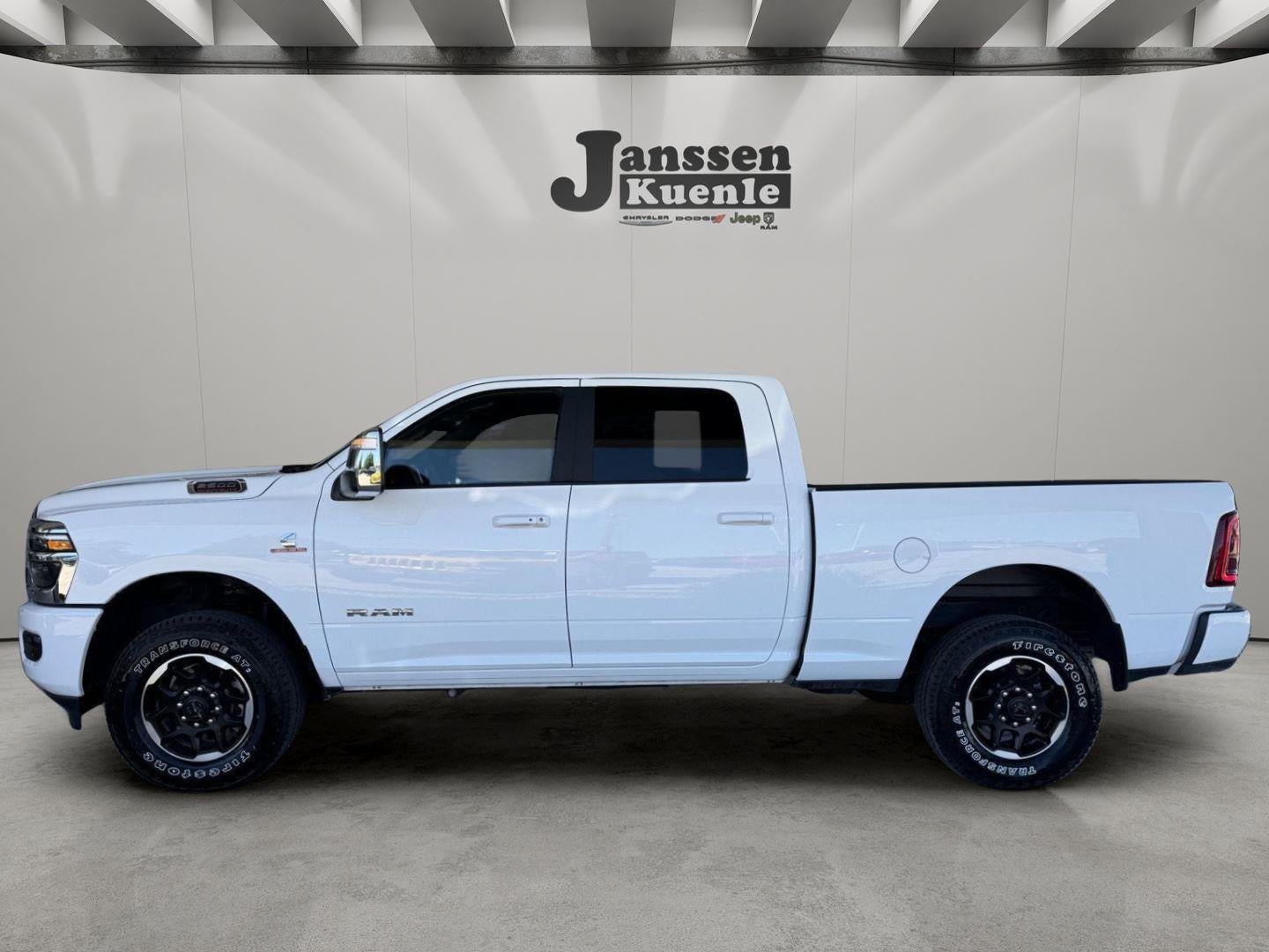 2026 RAM 2500 Laramie Crew Cab 4x4 6'4' Box in Bright White Clearcoat — front three-quarter view