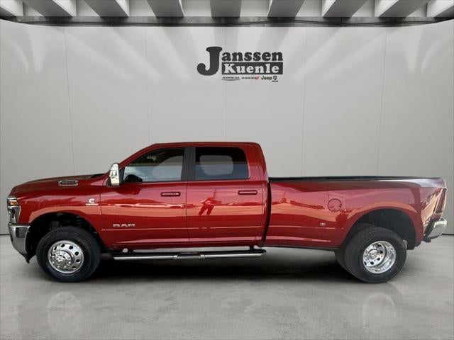 2026 RAM Ram 3500 RAM 3500 LARAMIE CREW CAB 4X4 8' BOX in Molten Red Pearl-Coat Exterior Paint — front three-quarter view