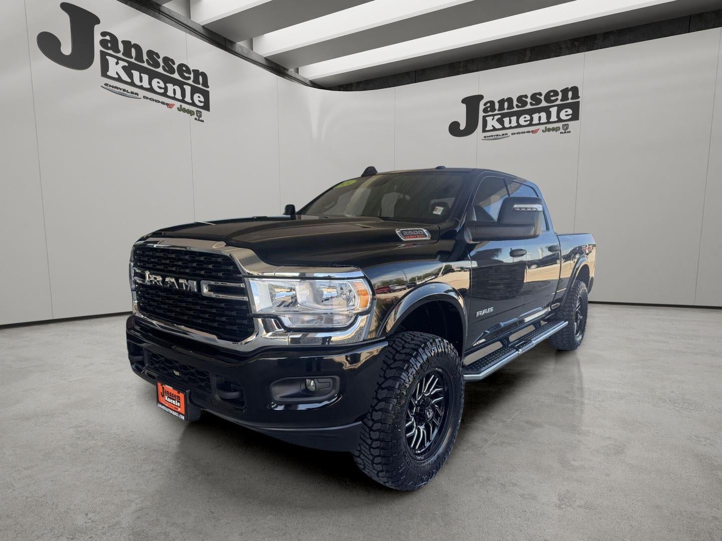 2024 RAM 2500 Big Horn Crew Cab 4x4 6'4' Box in Diamond Black Crystal Pearlcoat — front three-quarter view