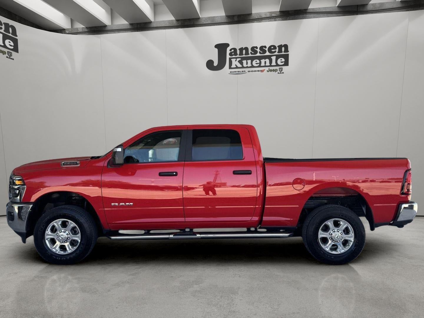 2026 RAM 2500 Big Horn Crew Cab 4x4 6'4' Box in Flame Red Clearcoat — front three-quarter view