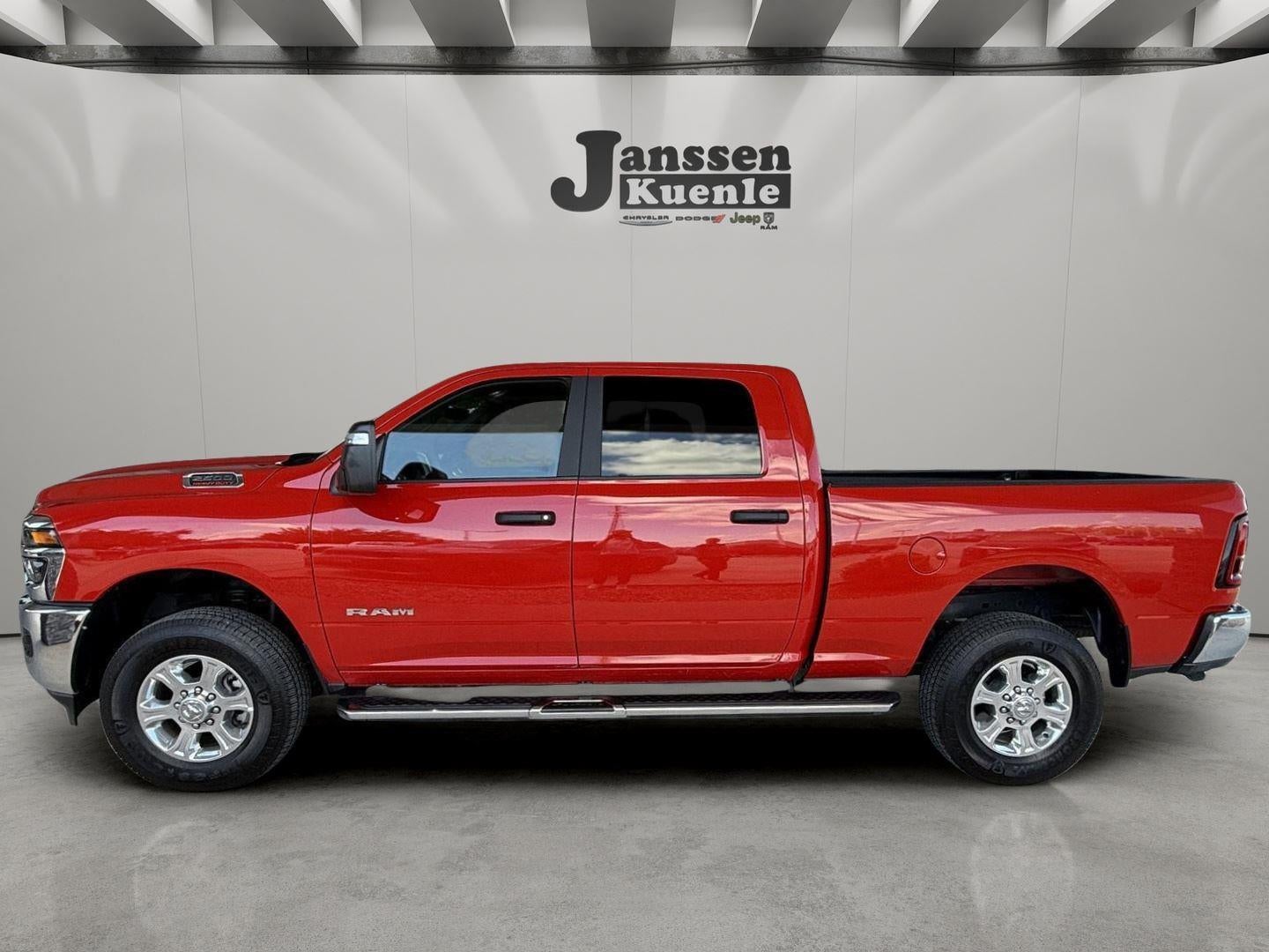2026 RAM 2500 Big Horn Crew Cab 4x4 6'4' Box in Flame Red Clearcoat — front three-quarter view