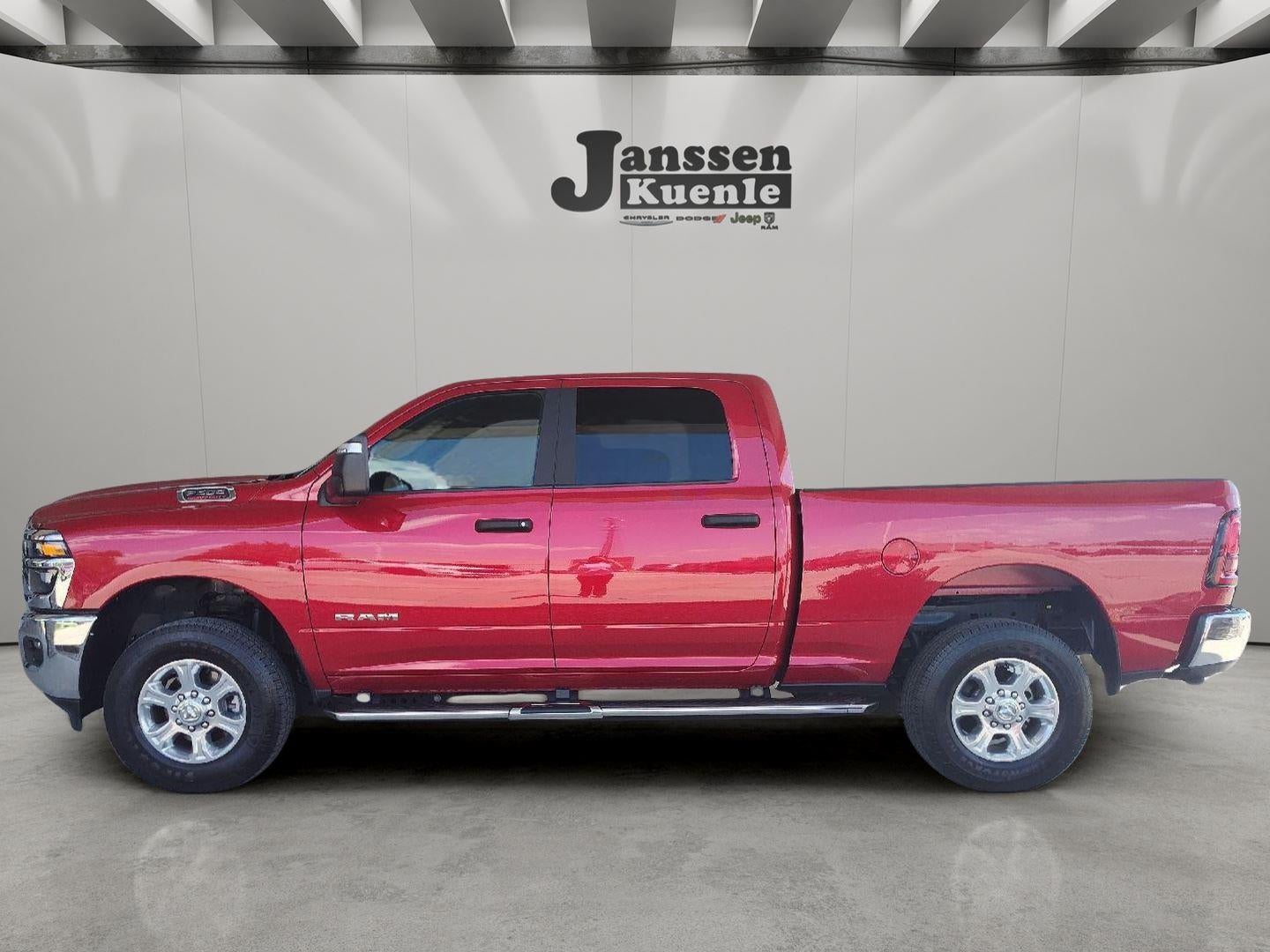 2026 RAM 2500 Big Horn Crew Cab 4x4 6'4' Box in Molten Red Pearlcoat — front three-quarter view