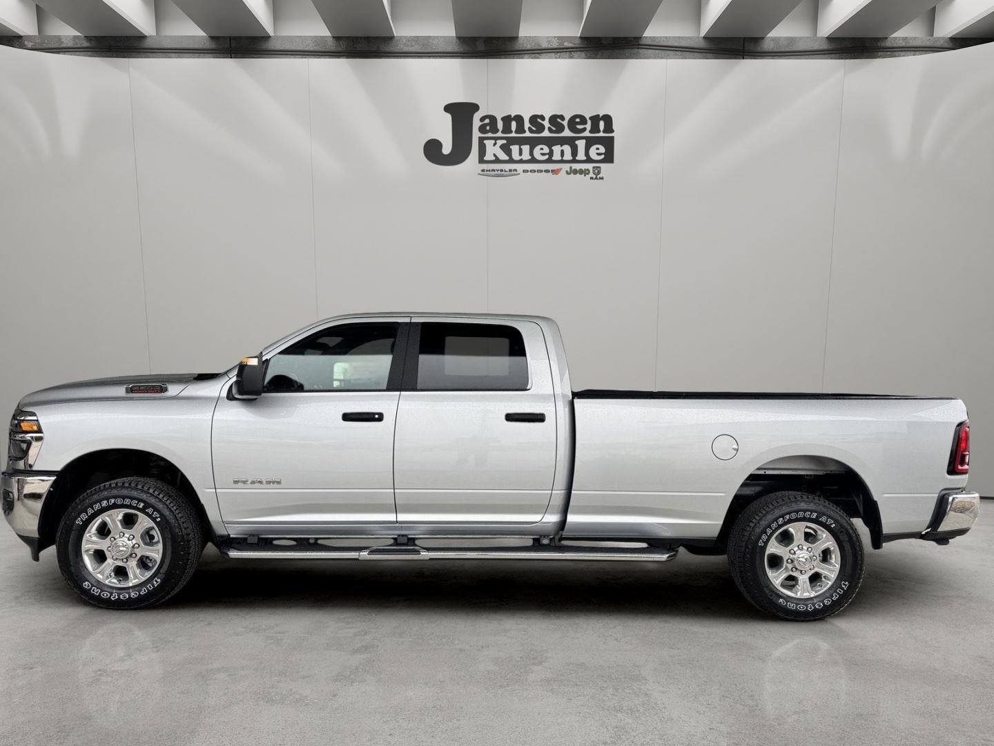 2026 RAM Ram 2500 RAM 2500 BIG HORN CREW CAB 4X4 8' BOX in Silver-Zynith Exterior Paint — front three-quarter view