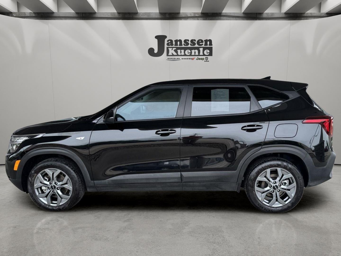 2026 Kia Seltos LX in Fusion Black — front three-quarter view